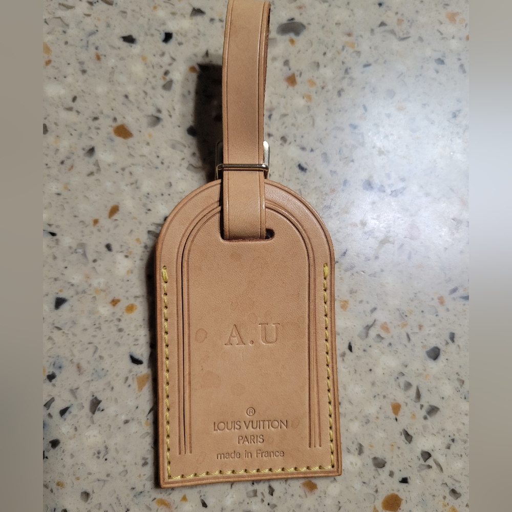 Louis vuitton luggage tag. Great used condition.